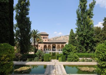 view-across-ponds-in-the-formal-partal-gardens-to-torre-de-las-damas-tower-of-the-ladies-the-alhambra_t20_znYayr